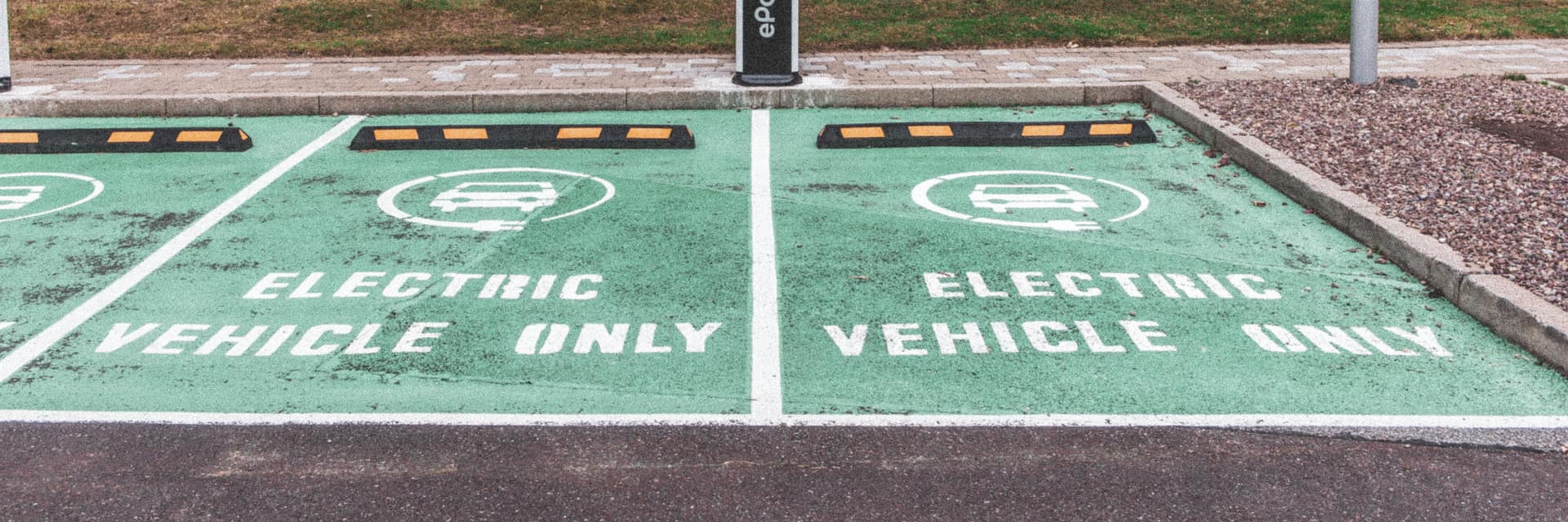Charging bays marked 'electric vehicle only', ready for an intensive-use fleet